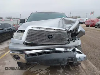 2012 Toyota Tundra z VIN 5TFRY5F18CX121917, wystawiony jako IAAI lot #41475681 z przebiegiem 166 507 mil mil oraz . Historia ofert i sprzedaży dostępna na DreamBid. Obrazek 12.
