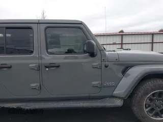 2022 Jeep Gladiator High Altitude with VIN 1C6HJTFG4NL131029, listed as a IAAI auction lot 41789060 with 50,347 mi miles and . Bid and sale history available at DreamBid. Image 14.