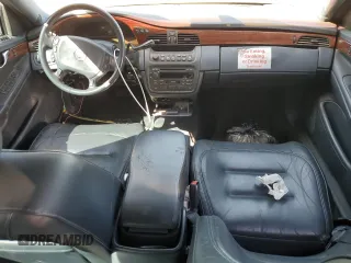2002 Cadillac DeVille Limousine z VIN 1GEEH90Y72U550842, wystawiony jako Copart lot #52629735 z przebiegiem Nie podano mil oraz Szkoda całkowita • Salvage title. Historia ofert i sprzedaży dostępna na DreamBid. Obrazek 8.