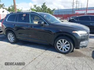 2016 Volvo XC90 T6 Momentum z VIN YV4A22PK7G1069884, wystawiony jako IAAI lot #42247951 z przebiegiem 116 640 mil mil oraz . Historia ofert i sprzedaży dostępna na DreamBid. Obrazek 1.