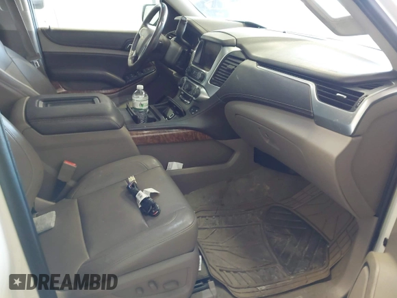 2015 Chevrolet Tahoe LTZ with VIN 1GNSKCKC9FR123996, listed as a IAAI auction lot 42113435 with 149,825 mi miles and . Bid and sale history available at DreamBid. Image 5.