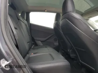 2021 Tesla Model Y Long Range z VIN 5YJYGDEE2MF204414, wystawiony jako Copart lot #59010585 z przebiegiem 56 371 mil mil oraz Szkoda całkowita • Salvage title. Historia ofert i sprzedaży dostępna na DreamBid. Obrazek 11.