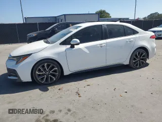 2020 Toyota Corolla SE with VIN JTDS4RCE7LJ031088, listed as a Copart auction lot 55450795 with 148,455 mi miles and Clean Title. Bid and sale history available at DreamBid. Image 1.