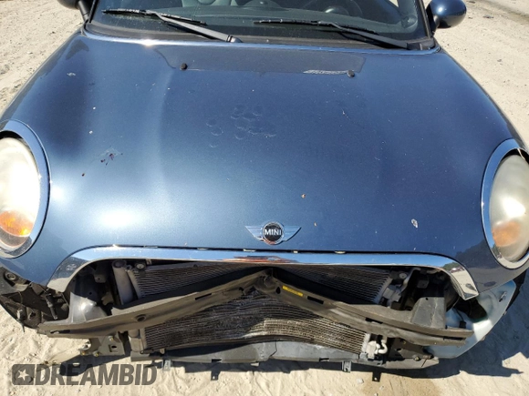2011 MINI Convertible z VIN WMWZN3C54BTZ78386, wystawiony jako Copart lot #75247934 z przebiegiem 55 875 mil mil oraz Szkoda całkowita • Salvage title. Historia ofert i sprzedaży dostępna na DreamBid. Obrazek 11.