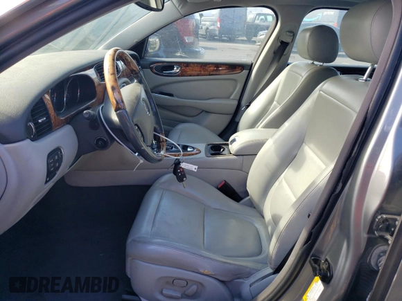 2005 Jaguar XJ with VIN SAJWA79C15SG40523, listed as a Copart auction lot 77994844 with 113,634 mi miles and Clean Title. Bid and sale history available at carsss.com. Image 7.