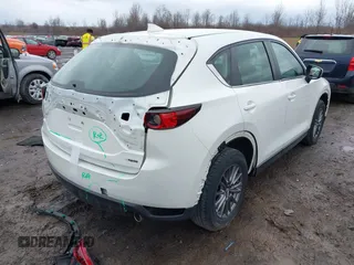 2019 Mazda CX-5 Sport with VIN JM3KFBBM2K0629966, listed as a IAAI auction lot 41953702 with 48,496 mi miles and . Bid and sale history available at DreamBid. Image 4.