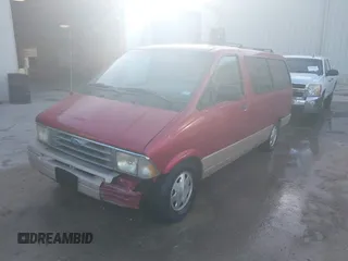 1996 Ford Aerostar with VIN 1FMDA31X1TZC09092, listed as a IAAI auction lot 41784476 with 173,065 mi miles. Bid and sale history available at carsss.com. Image 2.