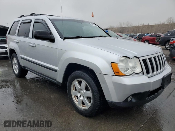 2009 Jeep Grand Cherokee Laredo with VIN 1J8HR48P19C555965, listed as a Copart auction lot 45602315 with 110,762 mi miles and Salvage Title. Bid and sale history available at carsss.com. Image 4.