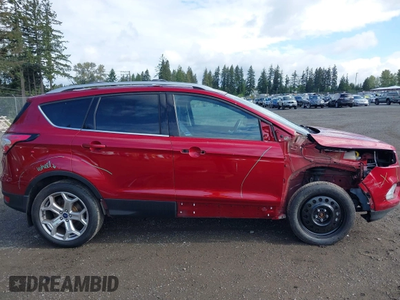 2018 Ford Escape Titanium with VIN 1FMCU9J99JUB44963, listed as a IAAI auction lot 42293113 with 68,803 mi miles and . Bid and sale history available at DreamBid. Image 14.
