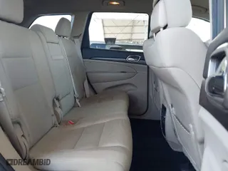 2014 Jeep Grand Cherokee Laredo with VIN 1C4RJFAG7EC380544, listed as a IAAI auction lot 42021130 with 166,589 mi miles. Bid and sale history available at carsss.com. Image 8.