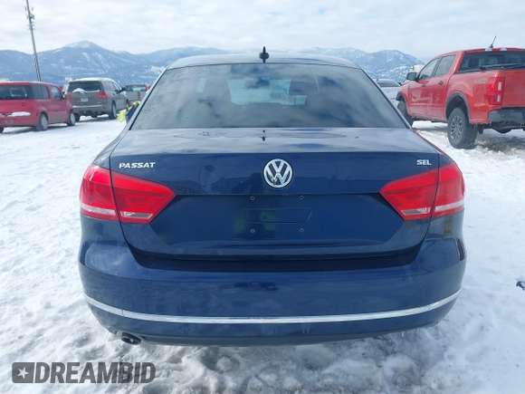 2013 Volkswagen Passat SEL Premium z VIN 1VWCP7A32DC089517, wystawiony jako IAAI lot #41546511 z przebiegiem 149 067 mil mil oraz . Historia ofert i sprzedaży dostępna na DreamBid. Obrazek 16.