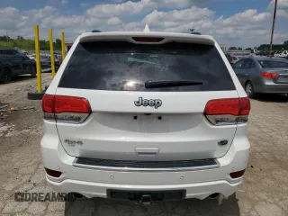 2017 Jeep Grand Cherokee Overland with VIN 1C4RJFCGXHC823593, listed as a Copart auction lot 58727205 with Not provided miles and Salvage title. Bid and sale history available at DreamBid. Image 6.