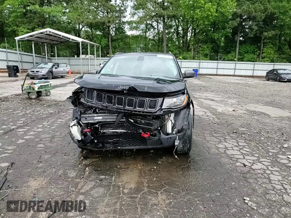 2018 Jeep Compass Trailhawk z VIN 3C4NJDDB4JT147867, wystawiony jako Copart lot #55981295 z przebiegiem 107 718 mil mil oraz Szkoda całkowita • Salvage title. Historia ofert i sprzedaży dostępna na DreamBid. Obrazek 14.