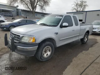 2002 Ford F-150 XL with VIN 1FTRX17W52NA62115, listed as a Copart auction lot 50415375 with 145,361 mi miles and Salvage title. Bid and sale history available at DreamBid. Image 1.
