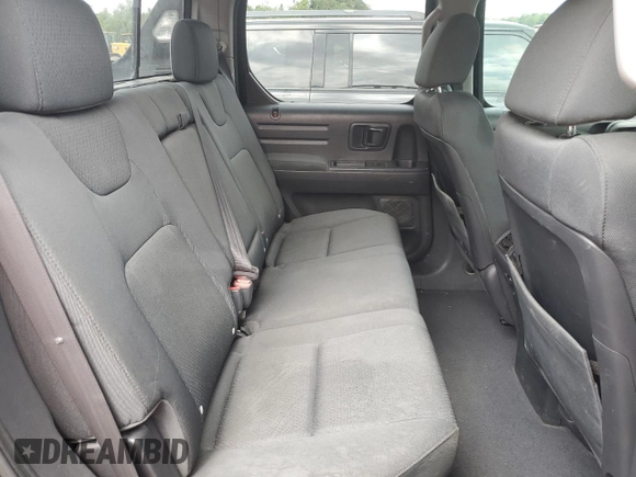 2014 Honda Ridgeline Sport with VIN 5FPYK1F75EB001197, listed as a Copart auction lot 65932295 with 121,862 mi miles and Salvage title. Bid and sale history available at DreamBid. Image 10.