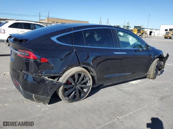 2017 Tesla Model X P100D with VIN 5YJXCBE4XHF077355, listed as a Copart auction lot 81426364 with NaN miles and Salvage Title. Bid and sale history available at carsss.com. Image 3.