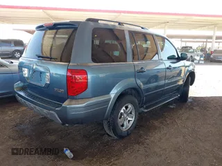 2005 Honda Pilot EX with VIN 2HKYF184X5H539427, listed as a IAAI auction lot 42004991 with 173,623 mi miles. Bid and sale history available at carsss.com. Image 4.