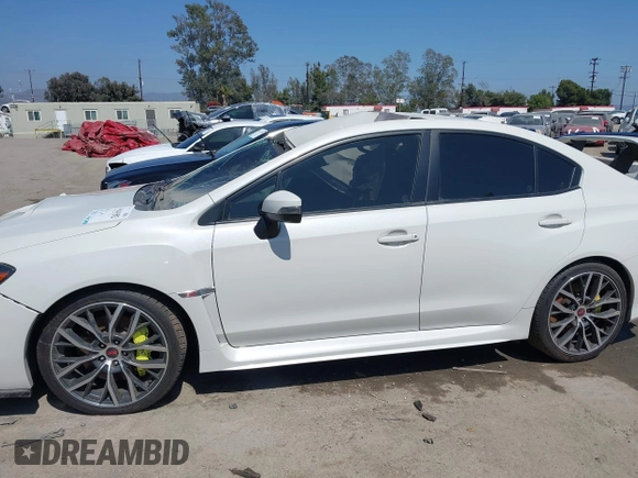 2019 Subaru WRX STI z VIN JF1VA2R6XK9814201, wystawiony jako IAAI lot #41641582 z przebiegiem 57 327 mil mil oraz . Historia ofert i sprzedaży dostępna na DreamBid. Obrazek 14.