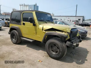 2003 Jeep Wrangler Sahara with VIN 1J4FA59S03P313418, listed as a Copart auction lot 64883094 with 184,658 mi miles and Salvage title. Bid and sale history available at DreamBid. Image 4.