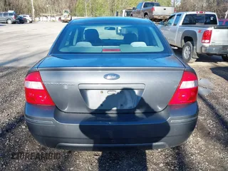2005 Ford Five Hundred SE z VIN 1FAFP231X5G145153, wystawiony jako IAAI lot #42059747 z przebiegiem 59 114 mil mil oraz . Historia ofert i sprzedaży dostępna na DreamBid. Obrazek 16.
