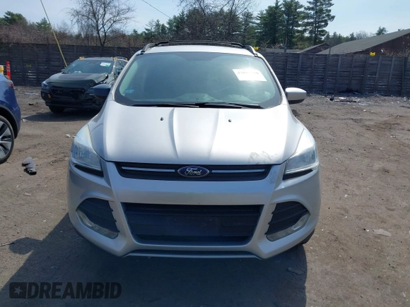 2016 Ford Escape SE z VIN 1FMCU9GXXGUB78201, wystawiony jako IAAI lot #42048676 z przebiegiem 139 144 mil mil oraz . Historia ofert i sprzedaży dostępna na DreamBid. Obrazek 12.