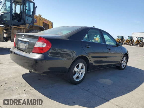 2004 Toyota Camry LE with VIN 4T1BE32K14U318133, listed as a Copart auction lot 54238185 with 293,761 mi miles and Salvage Title. Bid and sale history available at carsss.com. Image 3.