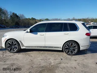 2020 BMW X7 xDrive40i with VIN 5UXCW2C05L9C18696, listed as a IAAI auction lot 41598890 with 102,599 mi miles. Bid and sale history available at carsss.com. Image 14.