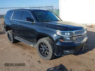 2016 Chevrolet Tahoe LT z VIN 1GNSKBKC5GR101215, wystawiony jako IAAI lot #42019503 z przebiegiem 132 386 mil mil oraz . Historia ofert i sprzedaży dostępna na DreamBid. Obrazek 1.