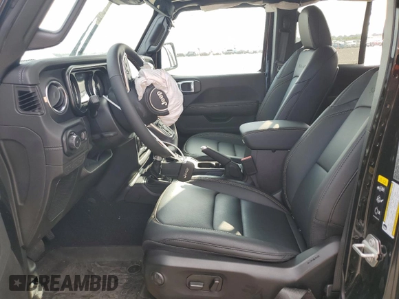2024 Jeep Wrangler Sahara with VIN 1C4PJXEG8RW262661, listed as a Copart auction lot 55464325 with 561 mi miles and Salvage title. Bid and sale history available at DreamBid. Image 7.