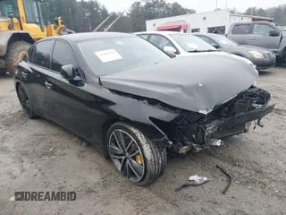 2015 Infiniti Q50 with VIN JN1BV7AP1FM347436, listed as a IAAI auction lot 41405852 with 126,940 mi miles. Bid and sale history available at carsss.com. Image 1.