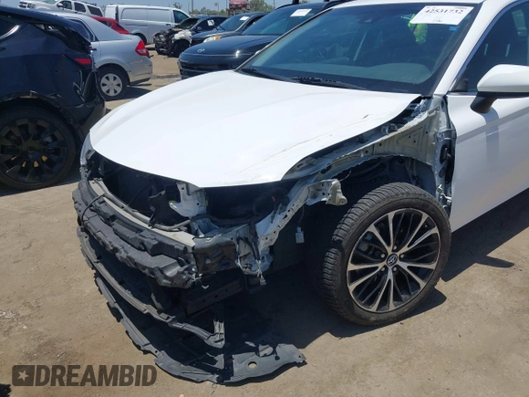 2018 Toyota Camry LE with VIN 4T1B11HK5JU007856, listed as a IAAI auction lot 42531732 with 121,020 mi miles and . Bid and sale history available at DreamBid. Image 6.