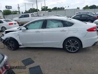 2020 Ford Fusion Titanium с VIN 3FA6P0D98LR151810, выставлен на аукционе IAAI как лот 42590902 с пробегом 76 624 миль миль и . История ставок и продаж доступна на DreamBid. Изображение 14.