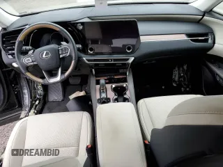 2023 Lexus RX with VIN JTJCHMAA9P2007464, listed as a Copart auction lot 74973084 with Not Provided miles and Non Repairable. Bid and sale history available at carsss.com. Image 8.