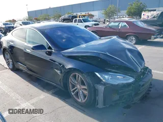 2013 Tesla Model S с VIN 5YJSA1AG1DFP09387, выставлен на аукционе IAAI как лот 41804124 с пробегом 126 615 миль миль и . История ставок и продаж доступна на DreamBid. Изображение 1.