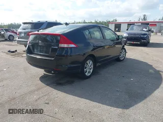 2010 Honda Insight EX with VIN JHMZE2H76AS000837, listed as a IAAI auction lot 42103333 with 146,576 mi miles and . Bid and sale history available at DreamBid. Image 4.