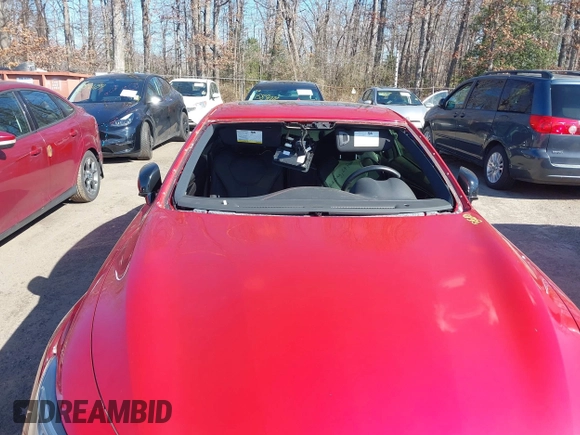 2021 Infiniti Q60 Red Sport 400 with VIN JN1FV7LL8MM560392, listed as a IAAI auction lot 41548964 with 14,057 mi miles and . Bid and sale history available at DreamBid. Image 6.