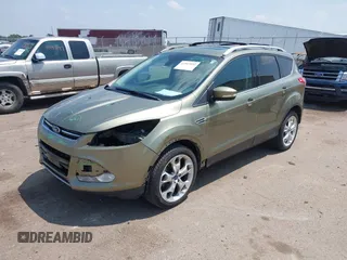 2013 Ford Escape Titanium with VIN 1FMCU9J98DUC45917, listed as a IAAI auction lot 42503892 with 173,284 mi miles and . Bid and sale history available at DreamBid. Image 2.