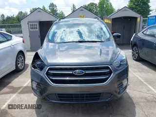 2019 Ford Escape SE z VIN 1FMCU0GD0KUB74569, wystawiony jako IAAI lot #42271476 z przebiegiem 66 335 mil mil oraz . Historia ofert i sprzedaży dostępna na DreamBid. Obrazek 13.