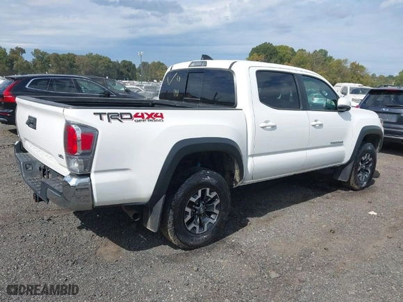 2021 Toyota Tacoma 4WD SR with VIN 3TMCZ5AN8MM424104, listed as a IAAI auction lot 40581284 with 74,706 mi miles. Bid and sale history available at carsss.com. Image 4.