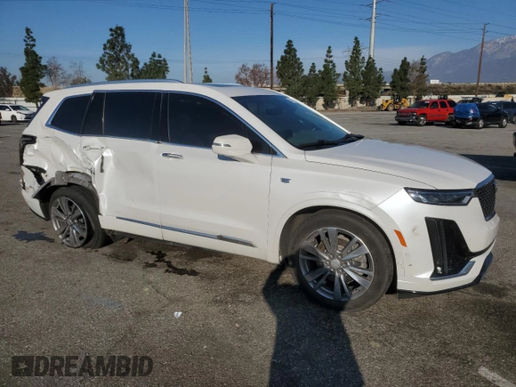 2022 Cadillac XT6 Premium Luxury with VIN 1GYKPFRS5NZ125360, listed as a Copart auction lot 45431165 with 47,511 mi miles and Salvage Title. Bid and sale history available at carsss.com. Image 4.