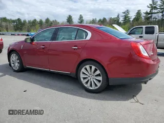 2013 Lincoln MKS EcoBoost with VIN 1LNHL9FT1DG609011, listed as a Copart auction lot 55793575 with Not provided miles and Salvage title. Bid and sale history available at DreamBid. Image 2.