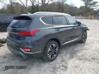 2020 Hyundai Santa Fe Limited with VIN 5NMS53AA2LH301974, listed as a IAAI auction lot 41614588 with 104,621 mi miles. Bid and sale history available at carsss.com. Image 4.