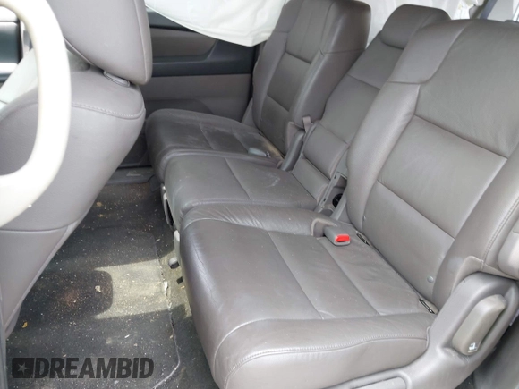 2012 Honda Odyssey Touring with VIN 5FNRL5H91CB121950, listed as a IAAI auction lot 42456620 with 200,831 mi miles and . Bid and sale history available at DreamBid. Image 8.