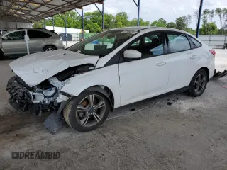 2018 Ford Focus SE with VIN 1FADP3FE5JL329350, listed as a Copart auction lot 57339055 with 61,391 mi miles and Salvage title. Bid and sale history available at DreamBid. Image 1.