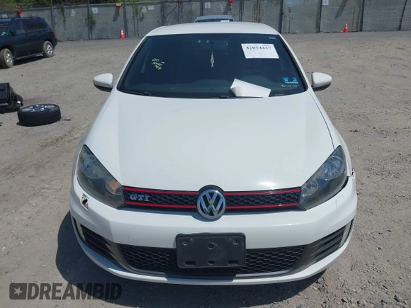 2013 Volkswagen GTI Driver's Edition z VIN WVWHV7AJ2DW135293, wystawiony jako IAAI lot #42054437 z przebiegiem 134 795 mil mil oraz . Historia ofert i sprzedaży dostępna na DreamBid. Obrazek 12.