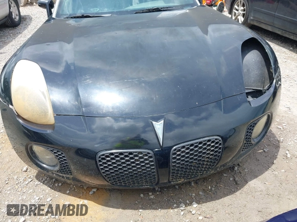 2007 Pontiac Solstice GXP z VIN 1G2MG35X17Y125299, wystawiony jako IAAI lot #42168624 z przebiegiem 123 526 mil mil oraz . Historia ofert i sprzedaży dostępna na DreamBid. Obrazek 12.