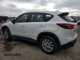 2015 Mazda CX-5 Sport z VIN JM3KE4BY2F0516574, wystawiony jako Copart lot #84100544 z przebiegiem Nie podano mil oraz Szkoda całkowita • Salvage title. Historia ofert i sprzedaży dostępna na DreamBid. Obrazek 2.
