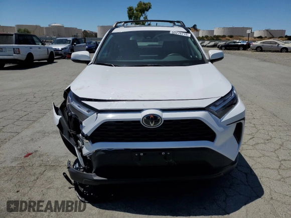 2022 Toyota RAV4 XLE with VIN 2T3W1RFV8NW233397, listed as a Copart auction lot 65276715 with 20,956 mi miles and Salvage title. Bid and sale history available at DreamBid. Image 5.
