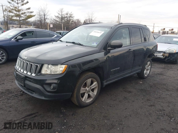 2013 Jeep Compass Latitude with VIN 1C4NJDEB3DD221904, listed as a IAAI auction lot 41691631 with 134,683 mi miles. Bid and sale history available at carsss.com. Image 2.