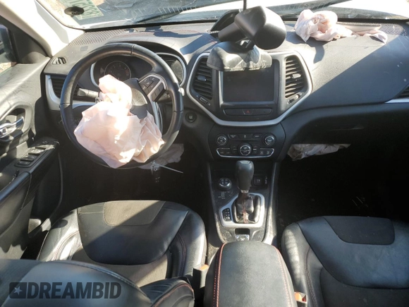 2017 Jeep Cherokee Trailhawk L Plus with VIN 1C4PJMBB3HW506965, listed as a Copart auction lot 82257594 with 106,571 mi miles and Salvage title. Bid and sale history available at DreamBid. Image 8.